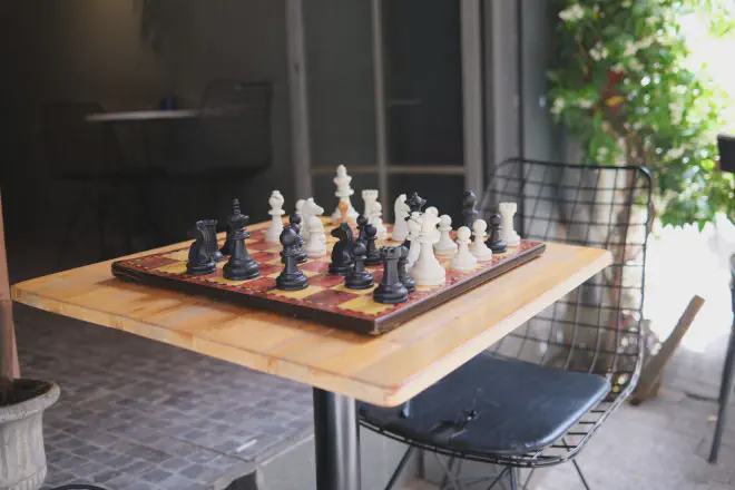 Checkerboard on table.